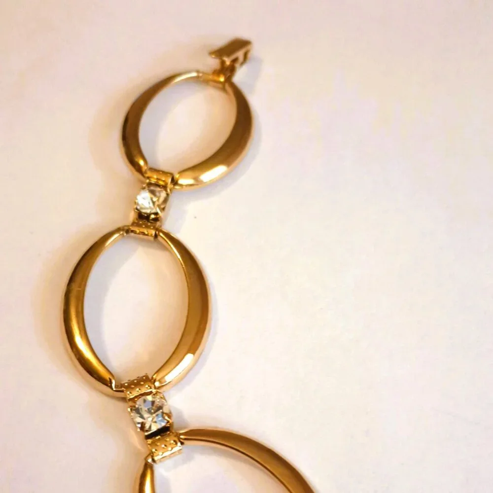 Avon gold tone